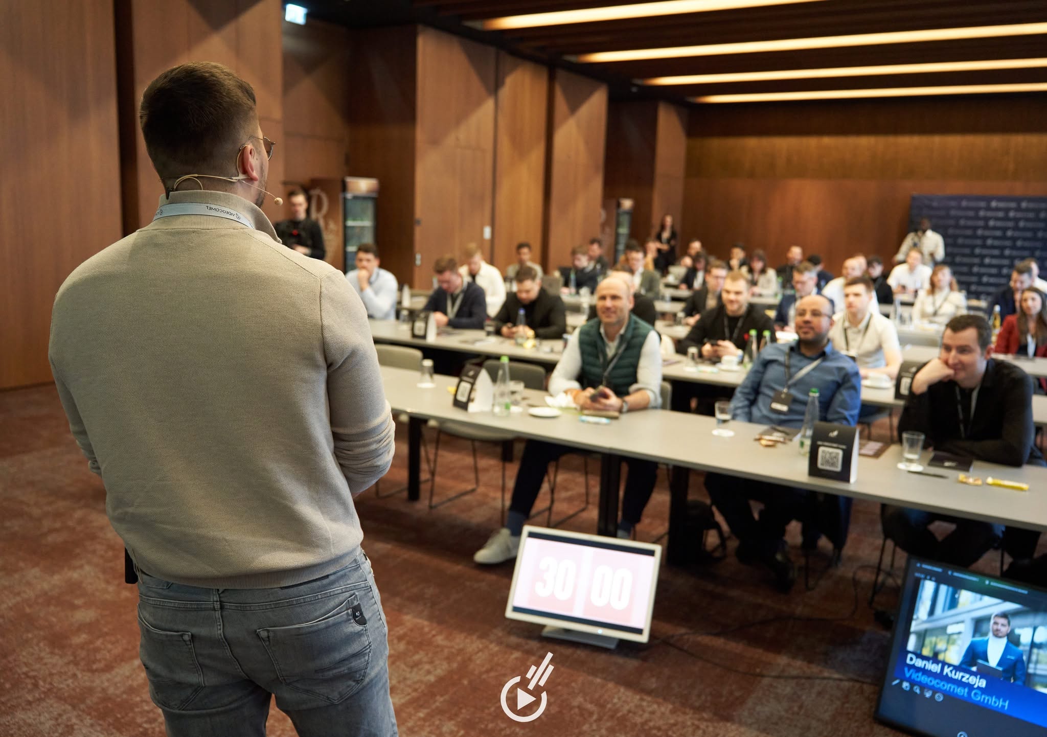 Speaker vor Publikum beim VIDEOCOMET-Day in Würzburg